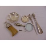 A quantity of silver to include a bonbon dish, a coaster, a magnifying glass, a shoe horn, a