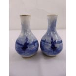 A pair of Crown Chelseaware blue and white vases decorated with sailing boats, marks to the bases