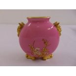 A Coalport miniature vase of globular form, pink ground with gilded floral sprays and mask side