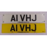 A private registration car number plate A1 VHJ with retention document, to include two plates