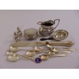 A quantity of silver and white metal to include a trinket box, a cream jug, teaspoons and knife with