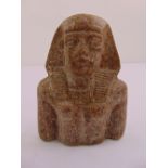 An Egyptian carved bust of a Pharaoh