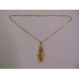 9ct yellow gold articulated pendant of a stylised clown on a 9ct yellow gold necklace, approx