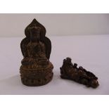 Two Chinese cast bronze figurines of Lohan and Guanyin