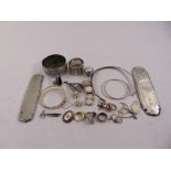 A quantity of costume jewellery and white metal to include napkin rings, brooches and bangles