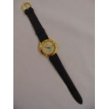 Gucci gold plated gentlemans wristwatch on leather strap