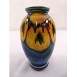 A Poole Pottery baluster vase blue and yellow glaze, marks to the base