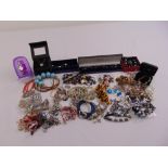 A quantity of costume jewellery to include pendants, necklaces, bracelets and earrings