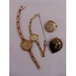 Three 9ct gold ladies wristwatches, two on 9ct gold bracelets and a gold and ebony pendant, A/F