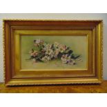 A framed oil on panel still life of flowers, monogrammed ED 1909, 19 x 36cm