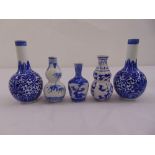Five Chinese blue and white vases of various shape and form