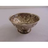 A Dutch late 18th century circular silver bowl the sides chased with figures, animals, leaves and
