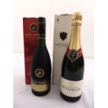 Bollinger champagne in fitted packaging and Remy Martin VSOP cognac in fitted packaging