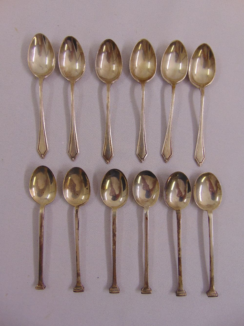 Six silver slip top coffee spoons and six others (12)