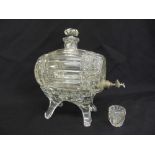 A Victorian glass decanter in the form of a barrel, on raised stand with accompanying miniature