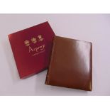 An Aspreys leather bound photograph album in original presentation packaging