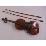 A student violin of customary and two accompanying bows, A/F