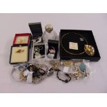 A quantity of costume jewellery to include vintage necklaces, brooches and earrings