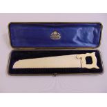 A Goldsmiths and Silversmiths late Victorian silver miniature saw with ivory handle, London 1895