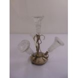 A silver plated epergne, the framework supporting four detachable cut glass vases