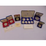A cased set of silver Coronation and Jubilee 1837-1953 medals to include COA and quantity of other