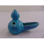 A Middle Eastern blue ground porcelain oil lamp of elongated oval form circa 1820