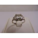 18ct white gold and diamond engagement ring, the centre diamond approx 2ct emerald cut with