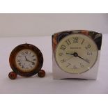 A Nepro faux tortoiseshell travel clock and a Tiffany bedside clock with Arabic numerals