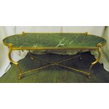 A gilt metal and green marble shaped oval coffee table on four scroll legs