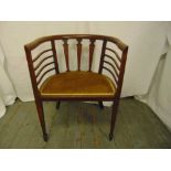 An Edwardian mahogany slatted back chair on tapering rectangular legs