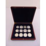 A cased set of twelve silver American eagle coins