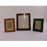 Three rectangular wooden photograph frames