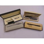 A quantity of cased fountain pens, pencils and ballpoint pens to include Parker and Cross (5)