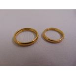 Two 22ct yellow gold wedding bands, approx total weight 9.3g