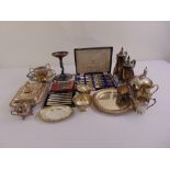 A quantity of silver plate to include entrée dish and cover, teapots, cake stands and cased