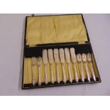 A cased set of silver fish knives and forks