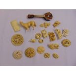 A quantity of carved composition and 19th century ivory brooches and novelty items (20)