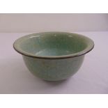 A Chinese celadon bowl, marks to the base