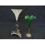 A silver and green glass vase and a silver plated and glass vase