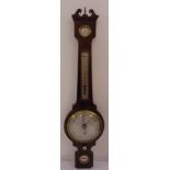 An Edwardian mahogany wall barometer and thermometer with swan neck pediment and brass finial