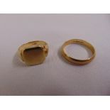 A 9ct gold wedding band and a 9ct gold signet ring, approx total weight 8.4g