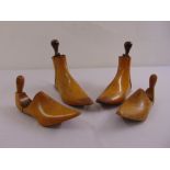 Two pairs of antique wooden shoe lasts