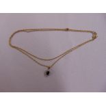 9ct yellow gold chain with 9ct gold sapphire and diamond pendant, approx total weight 3.6g