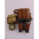 A pair of WWI Dollond Binoculars and a WWII military compass in original canvas case