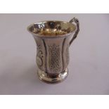 A Victorian silver christening mug of baluster form with panels engraved with flowers and scrolls,