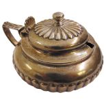 A George III silver mustard pot with hinged cover, shell thumb-piece and circular reeded body,