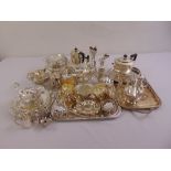 A quantity of silver plate to include a Mappin and Webb teaset, condiments, sauce boats and trays