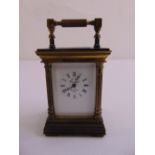 L'Epee a miniature brass carriage clock, white enamel dial with Roman numerals