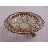 A Goldsmiths and Silversmiths circular silver scroll pierced bonbon dish with gadrooned borders on