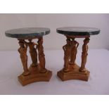 A pair of circular gilded metal marble top plant stands supported by three classical maidens on